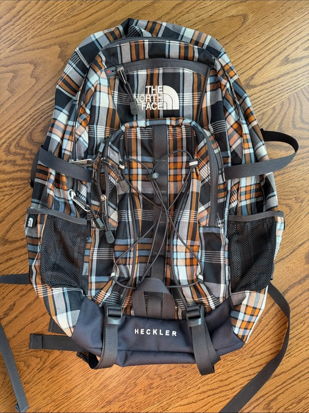The North Face Plaid Backpack in Black, Orange & Gray